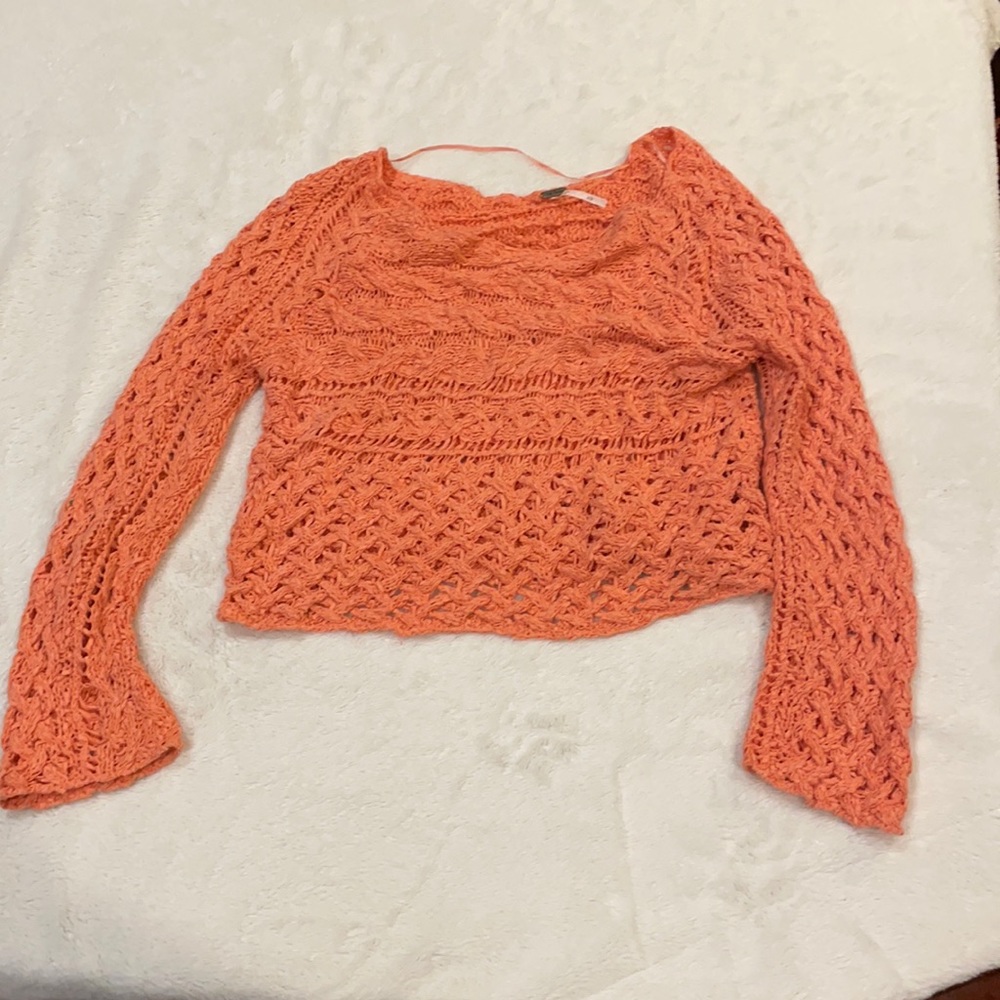 Free People cropped coral sweater.